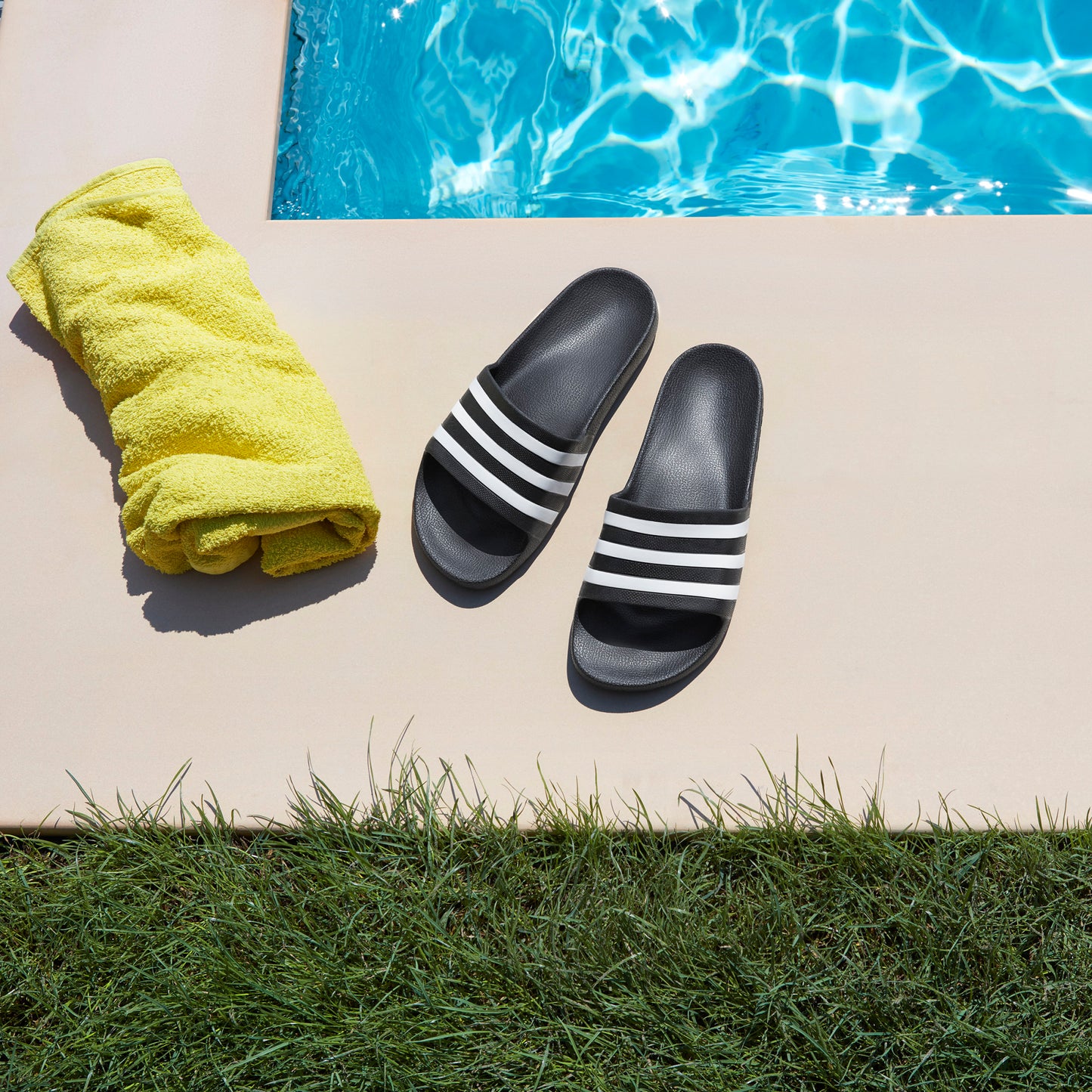ADILETTE AQUA SLIDES
Black/wht-F35543